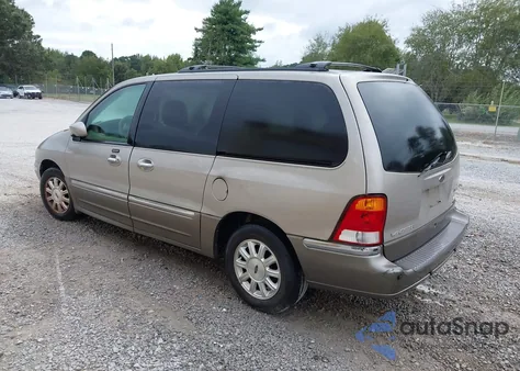 2003 Ford Windstar Limited z USA, uszkodzony, nr VIN 2FMDA58473BB41925